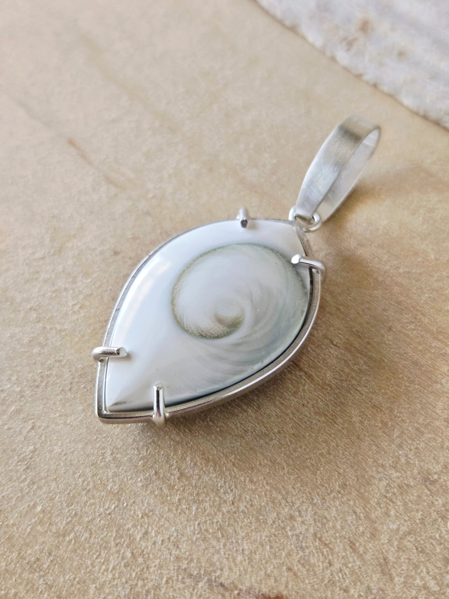 Reversible Spiral Shell Marquise charm/pendant