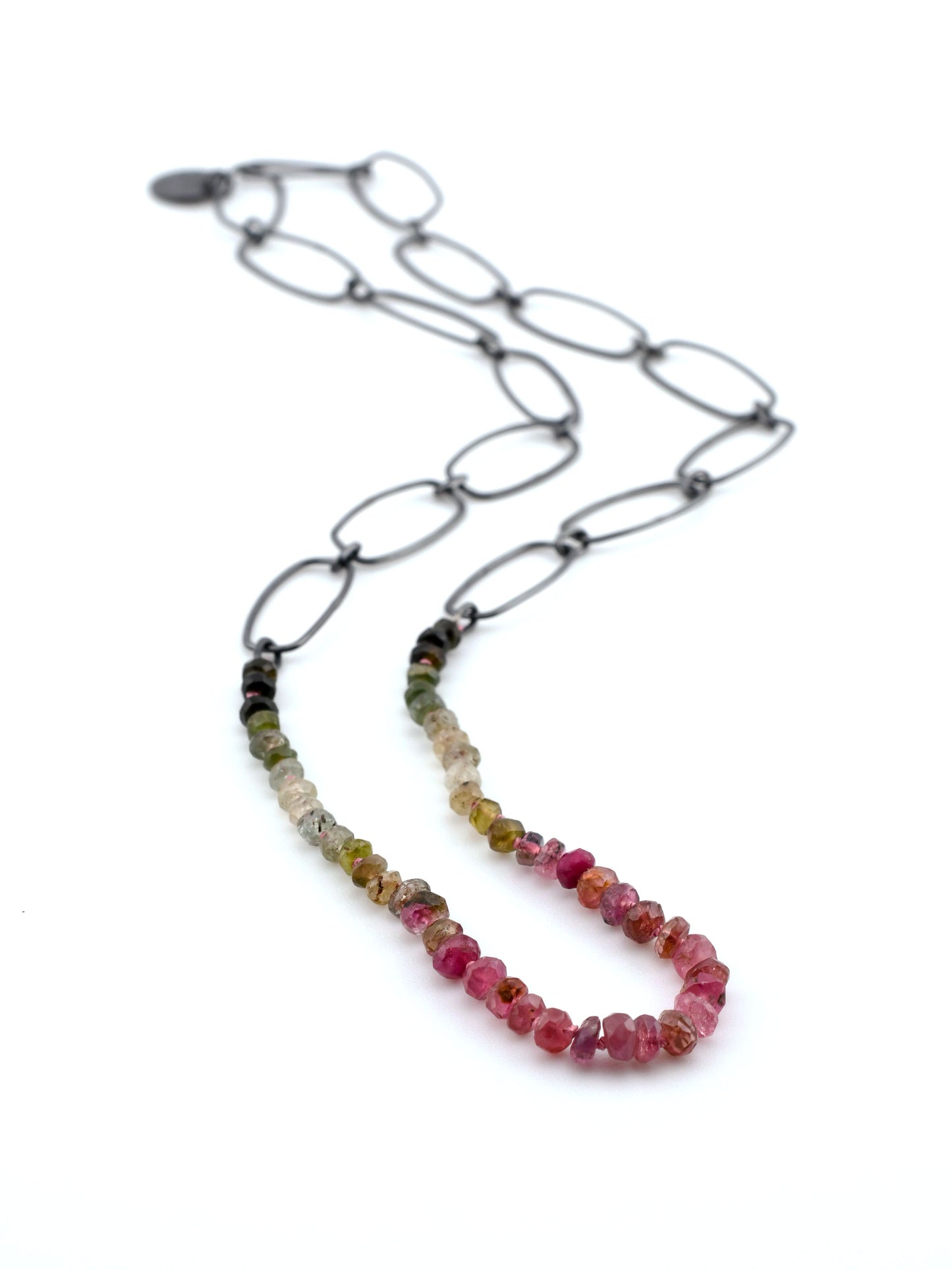 Necklace with multicolored beads on a white background