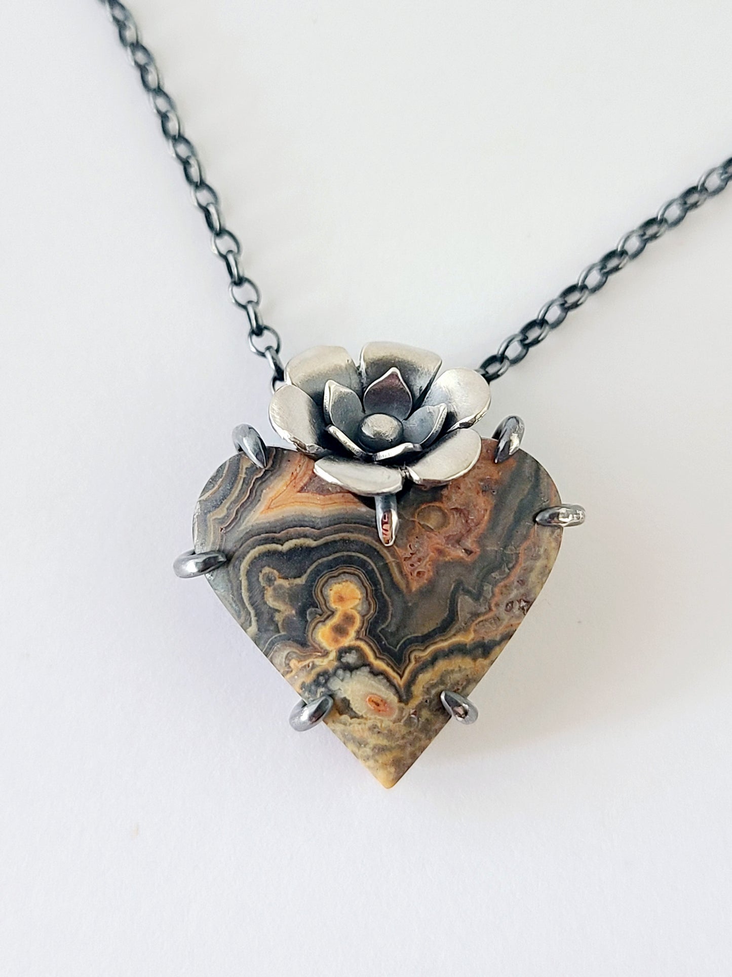 Flowering Heart Pendant with Flowering Tube Onyx