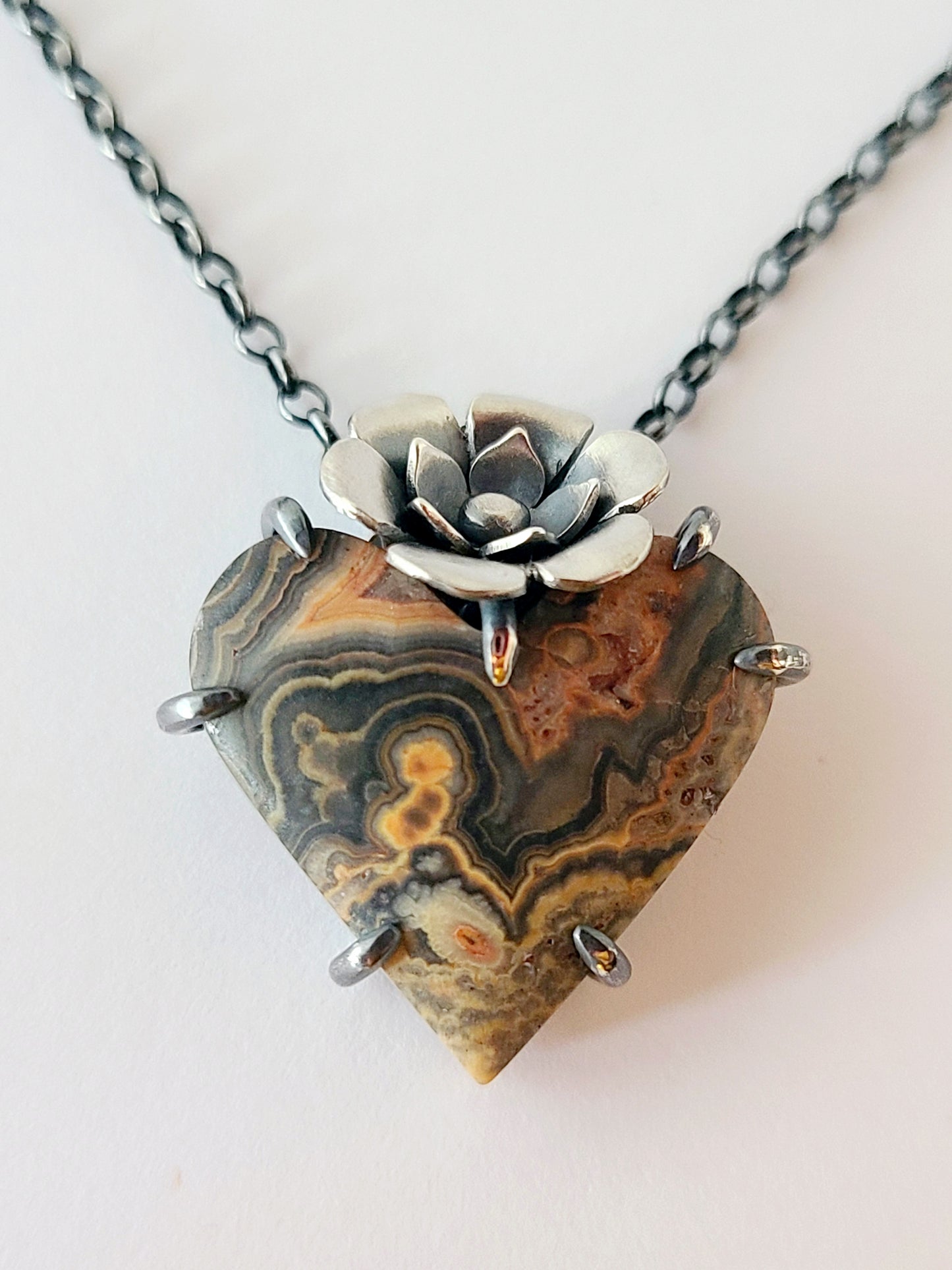 Flowering Heart Pendant with Flowering Tube Onyx