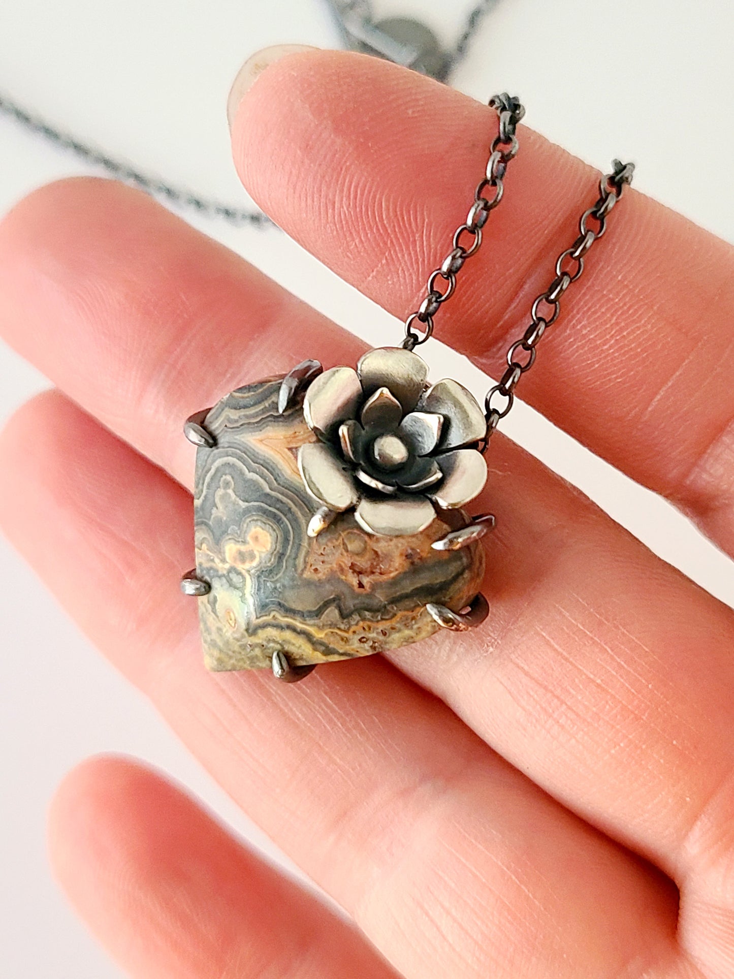 Flowering Heart Pendant with Flowering Tube Onyx