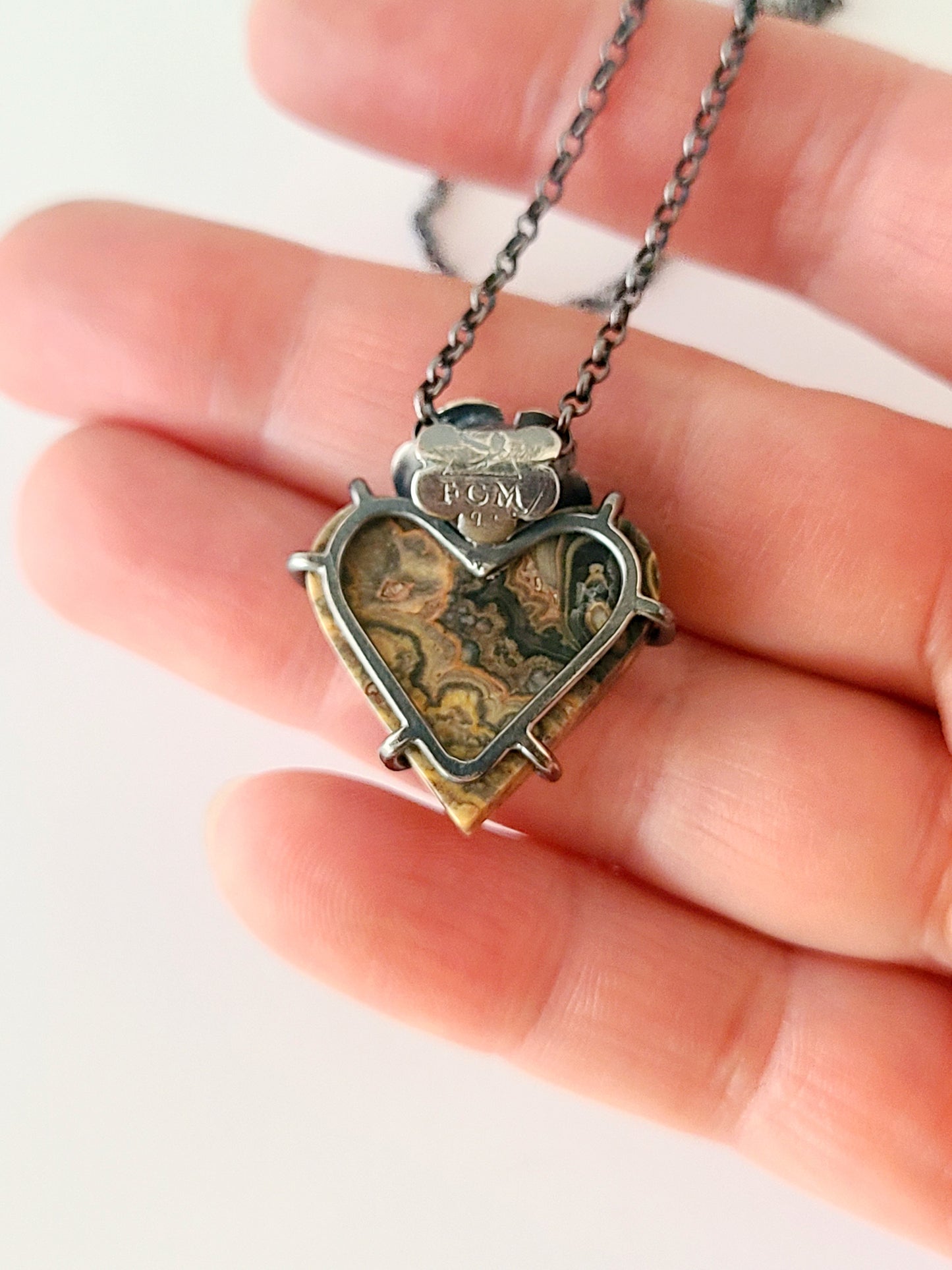 Flowering Heart Pendant with Flowering Tube Onyx