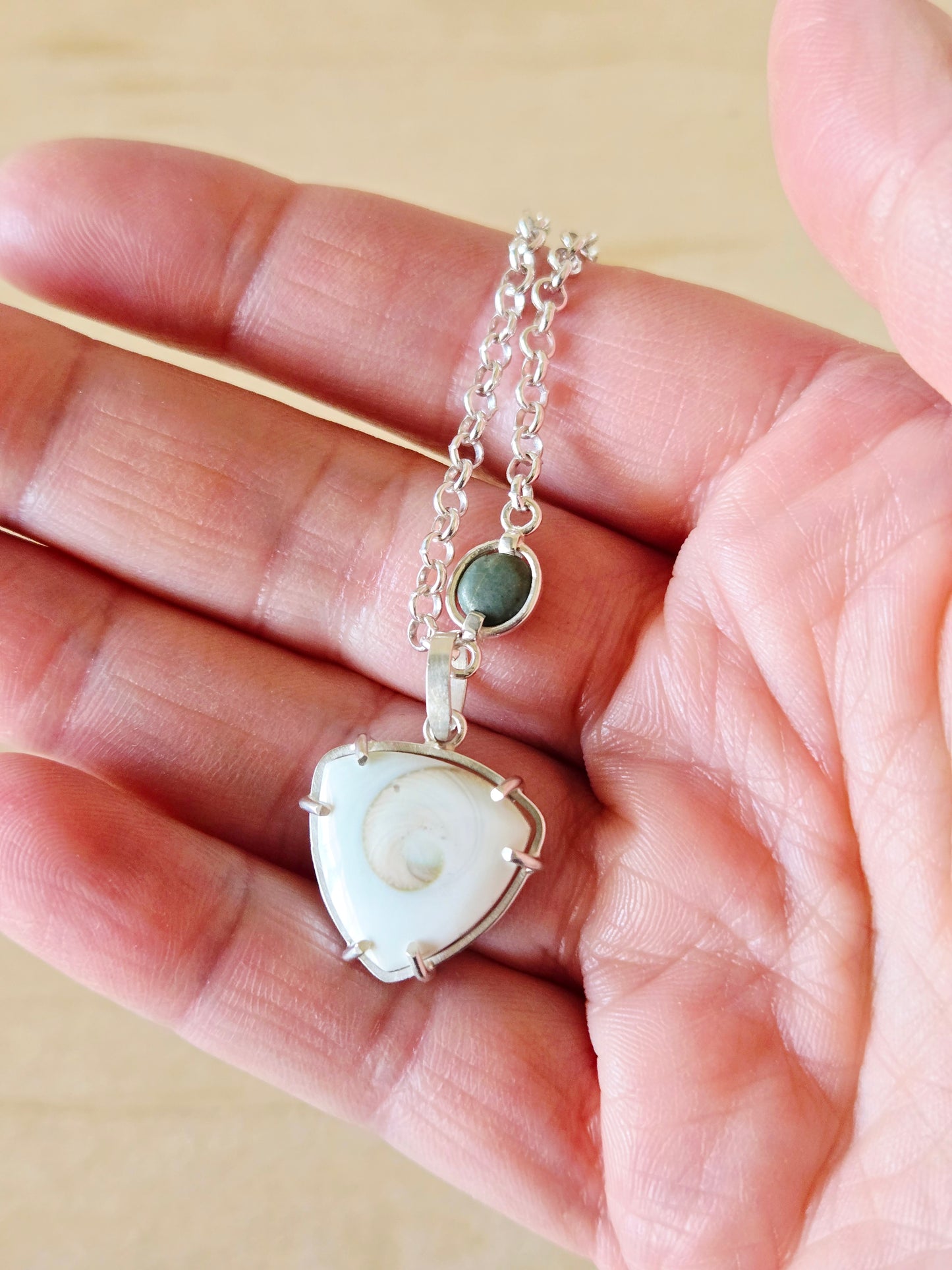 Reversible Spiral Shell Trillion charm/pendant
