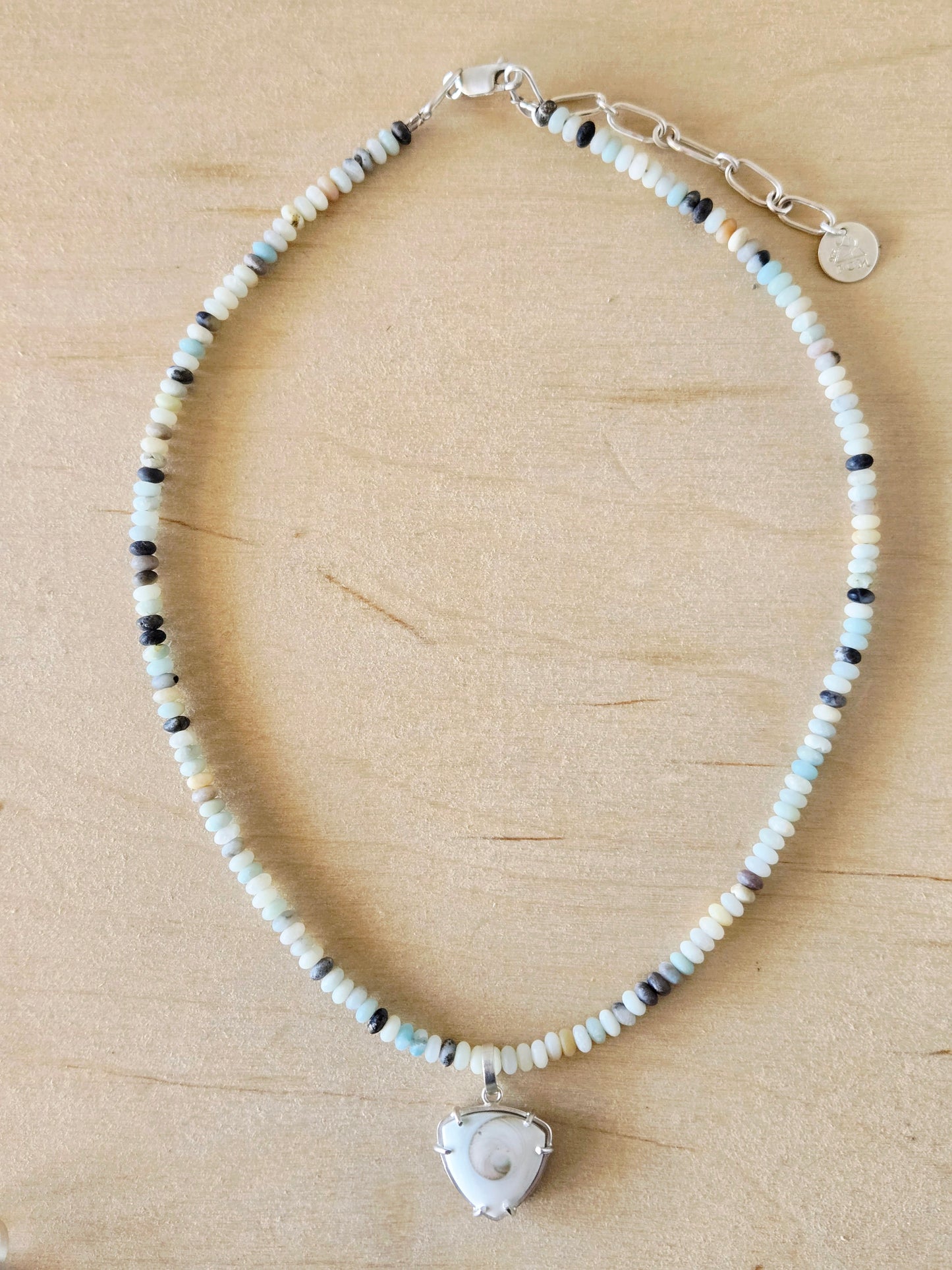 Reversible Spiral Shell Trillion charm/pendant