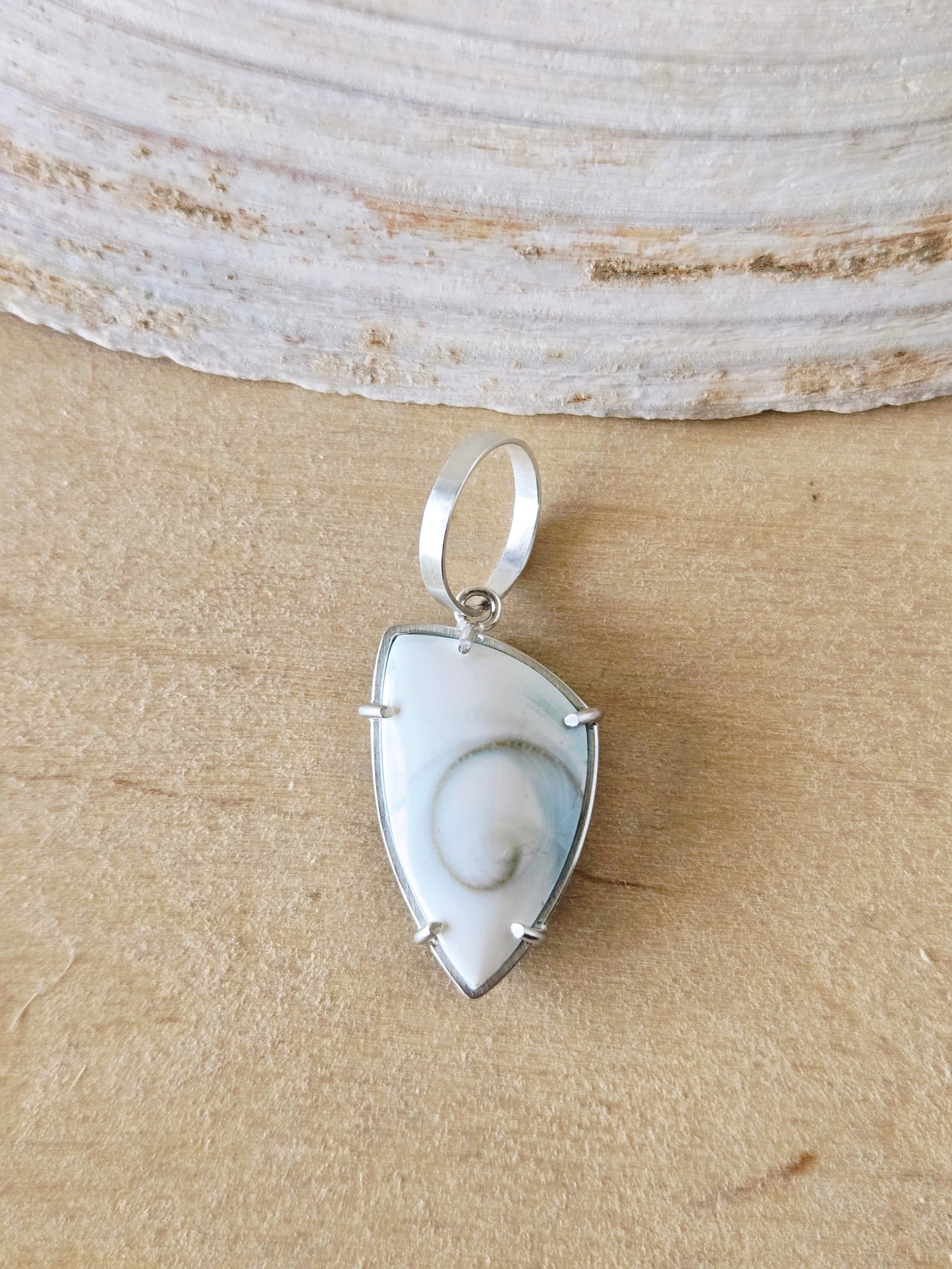 Reversible Spiral Shell Shield charm/pendant
