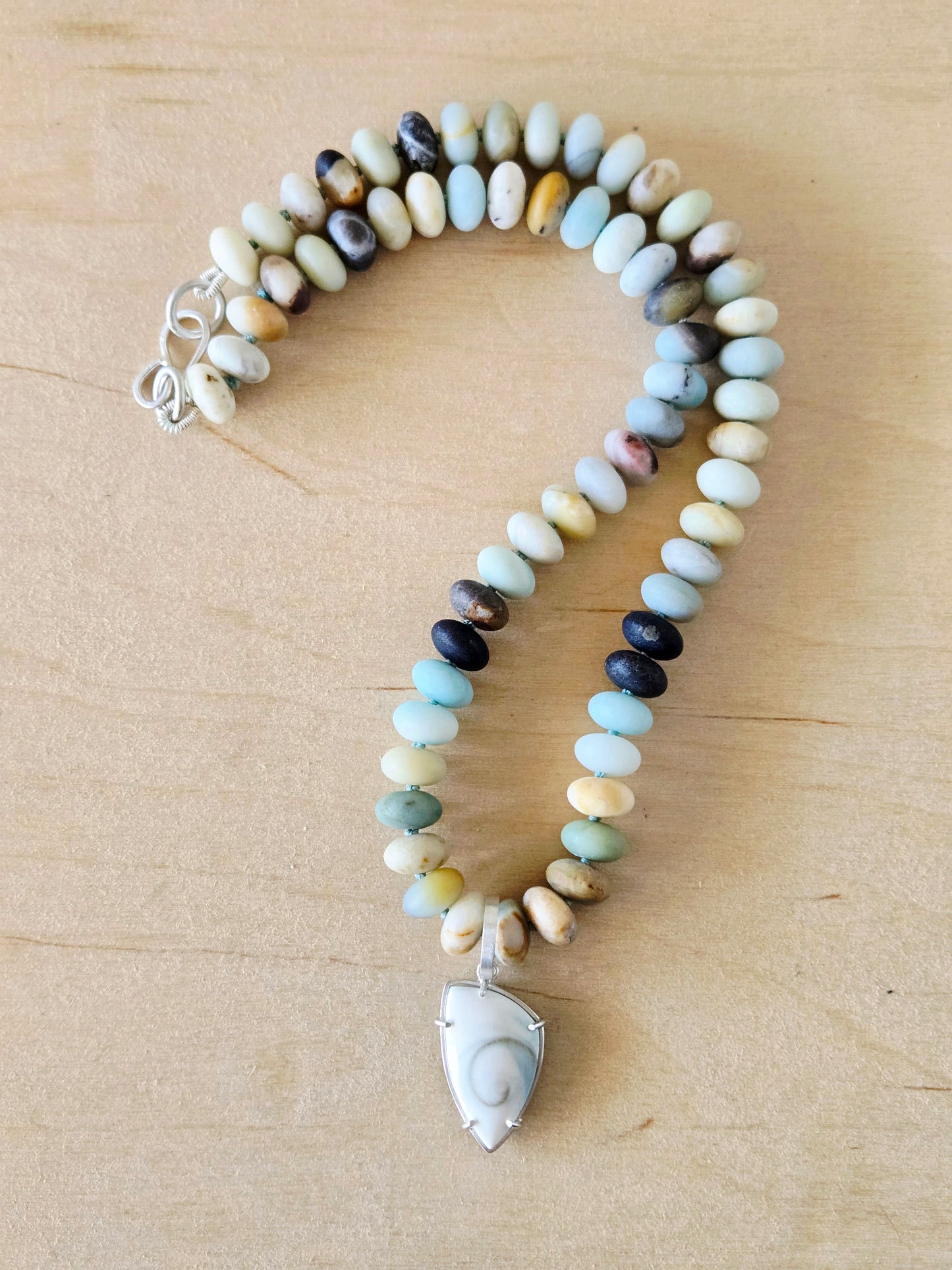 Reversible Spiral Shell Shield charm/pendant