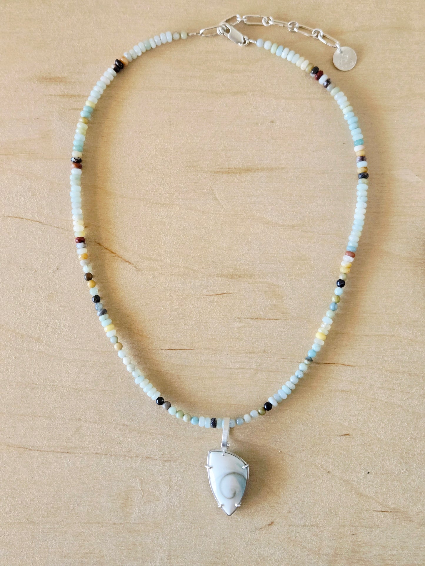 Reversible Spiral Shell Shield charm/pendant