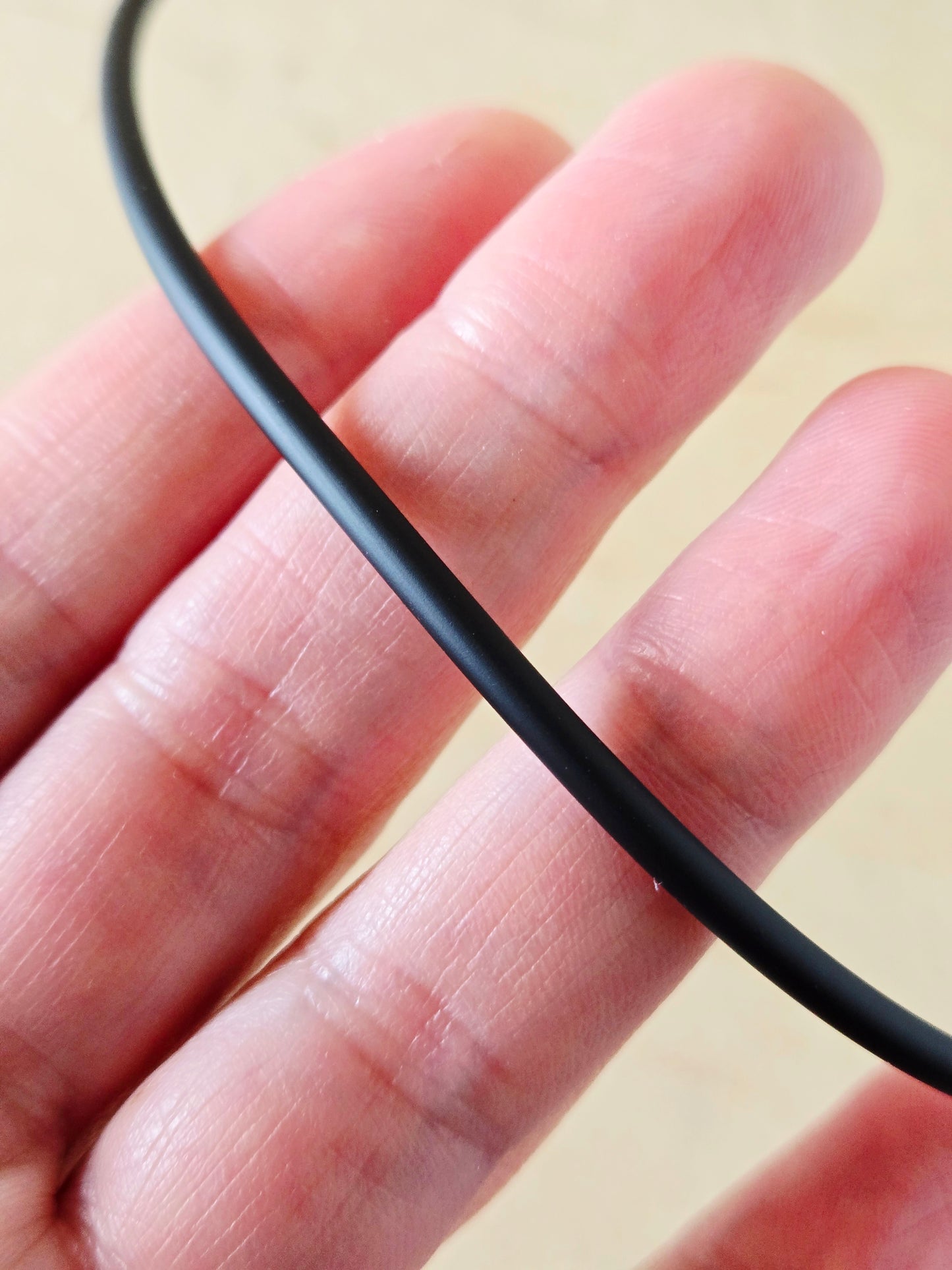 Sterling Silver and black rubber necklace cord: 18"