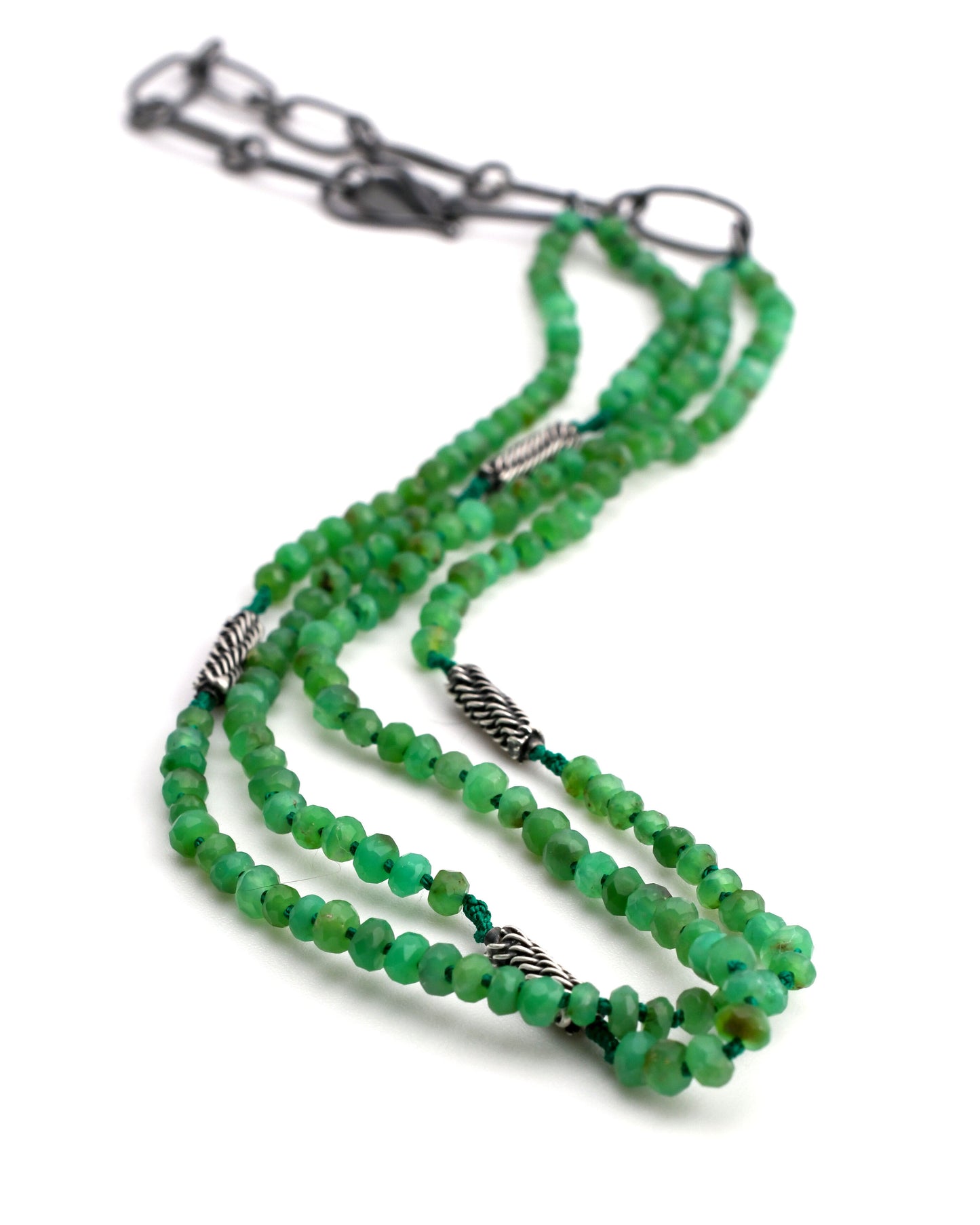 green chrysoprase double strand beaded necklace with woven silver beads and blackened silver chain extender on a white background