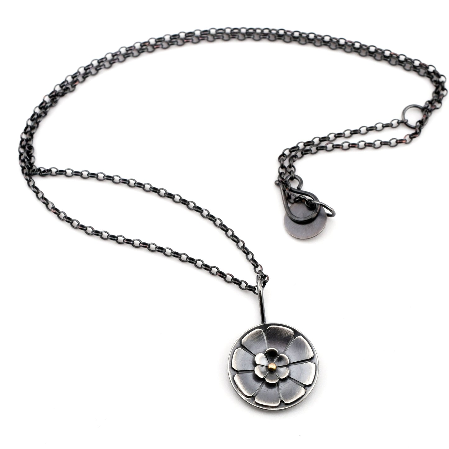 Necklace with a floral pendant on a white background