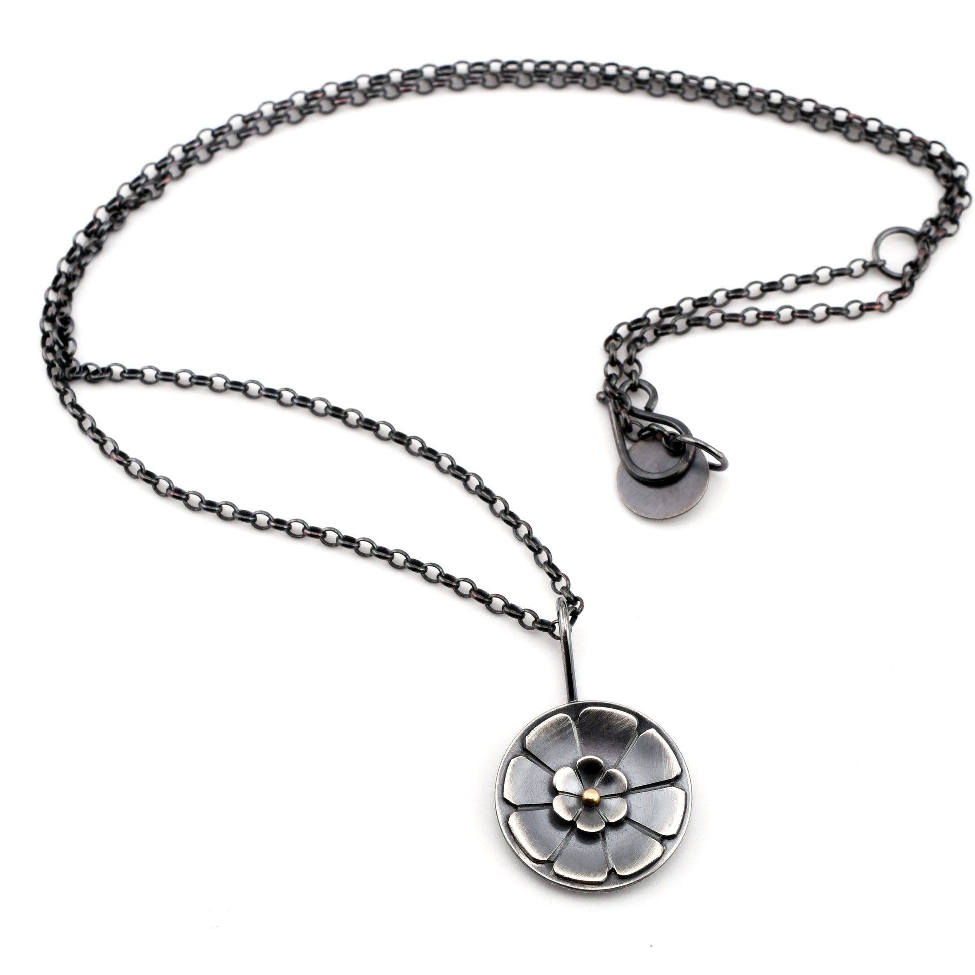 Necklace with a floral pendant on a white background