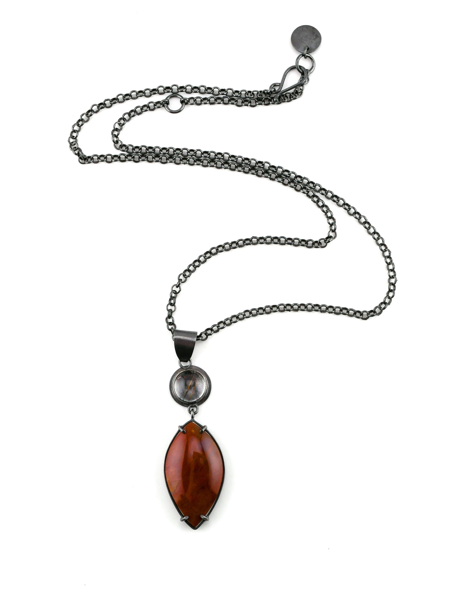 Necklace with a red pendant on a white background