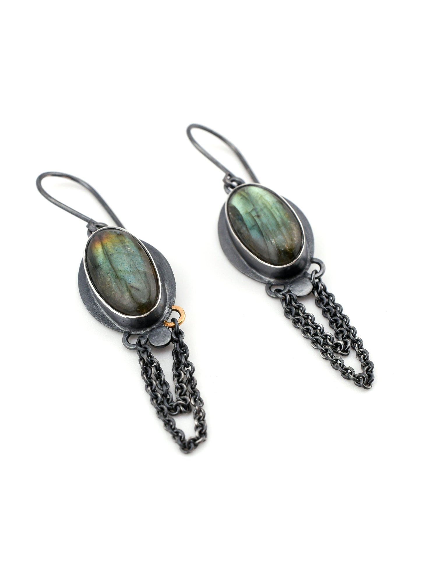 Pair of earrings with Labradorite stones and chain details on a white background