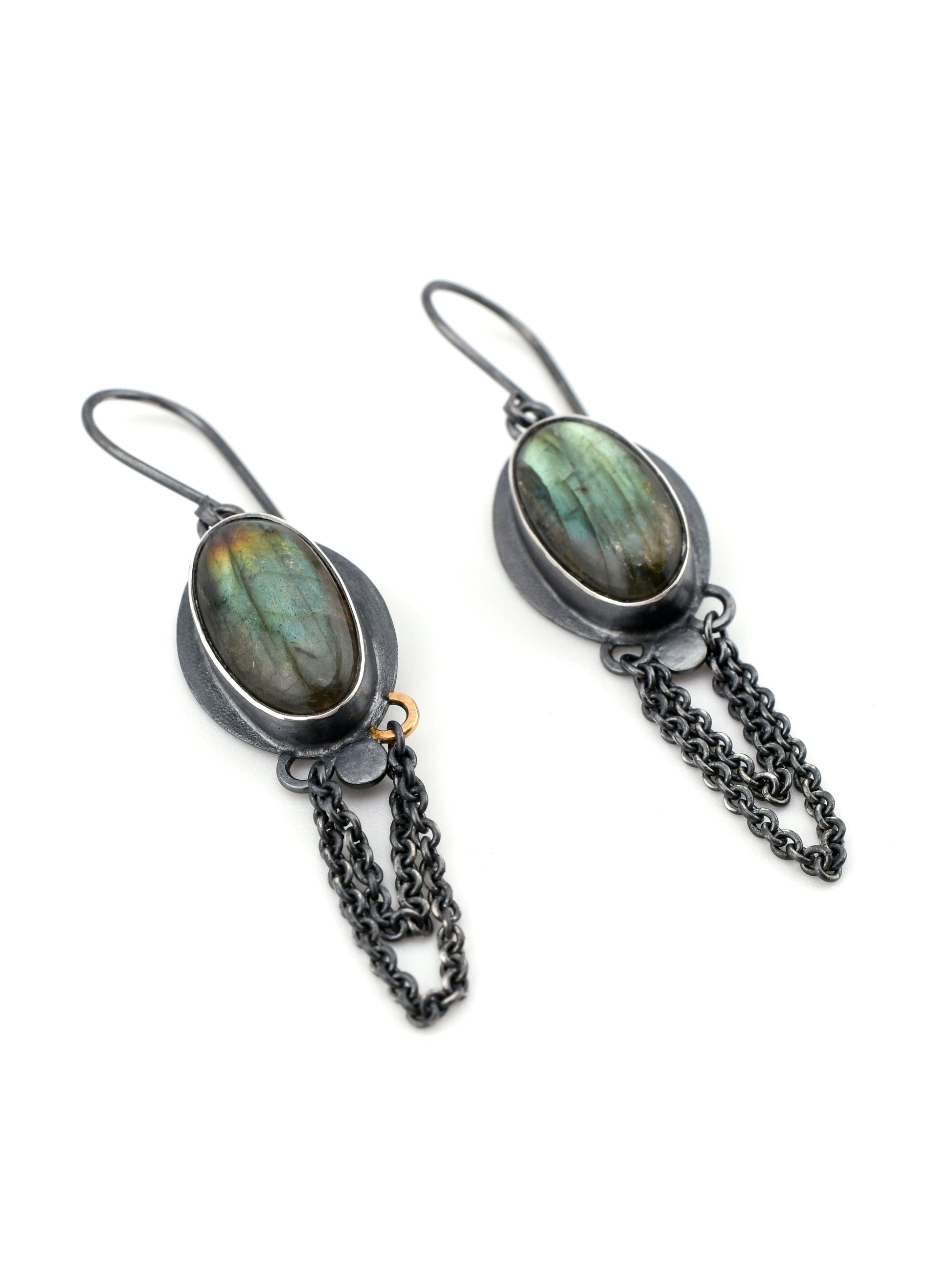 Pair of earrings with Labradorite stones and chain details on a white background