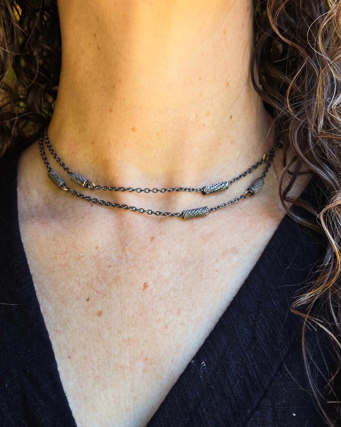 long slider necklace worn doubled 