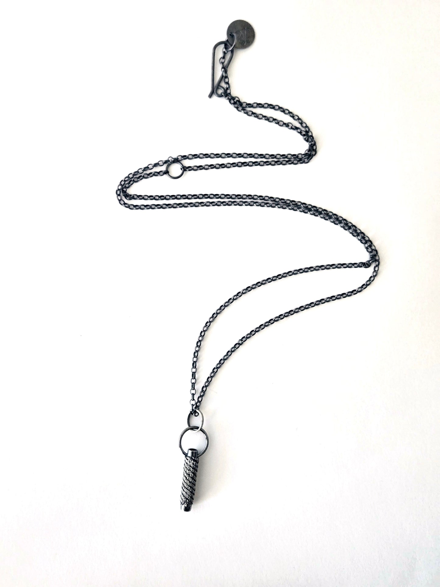 Necklace with a unique pendant on a white background