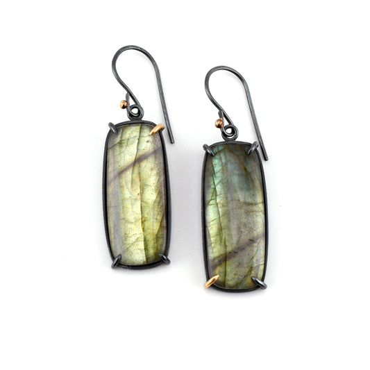 Pair of Labradorite earrings on a white background