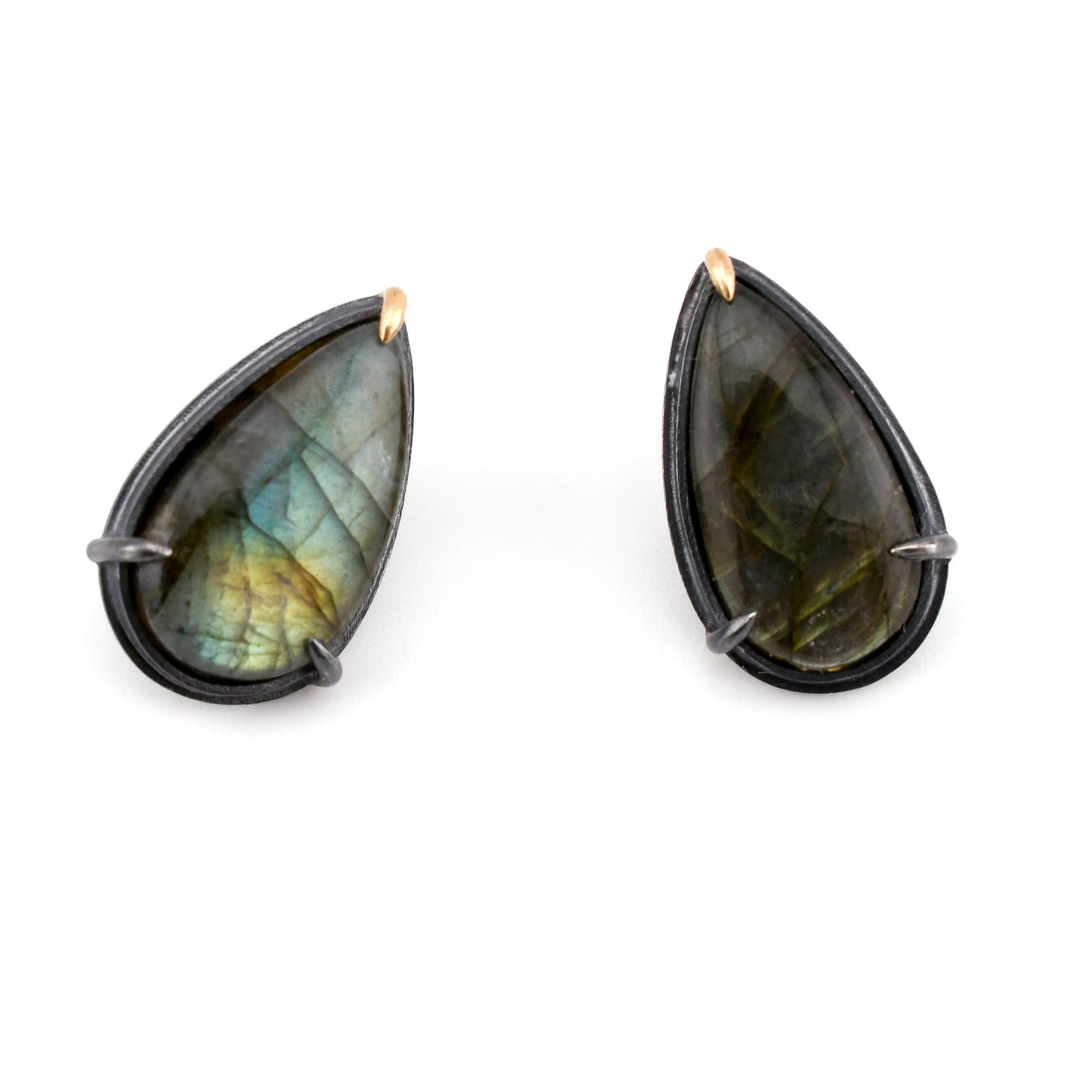 Teardrop-shaped labradorite earrings on a white background
