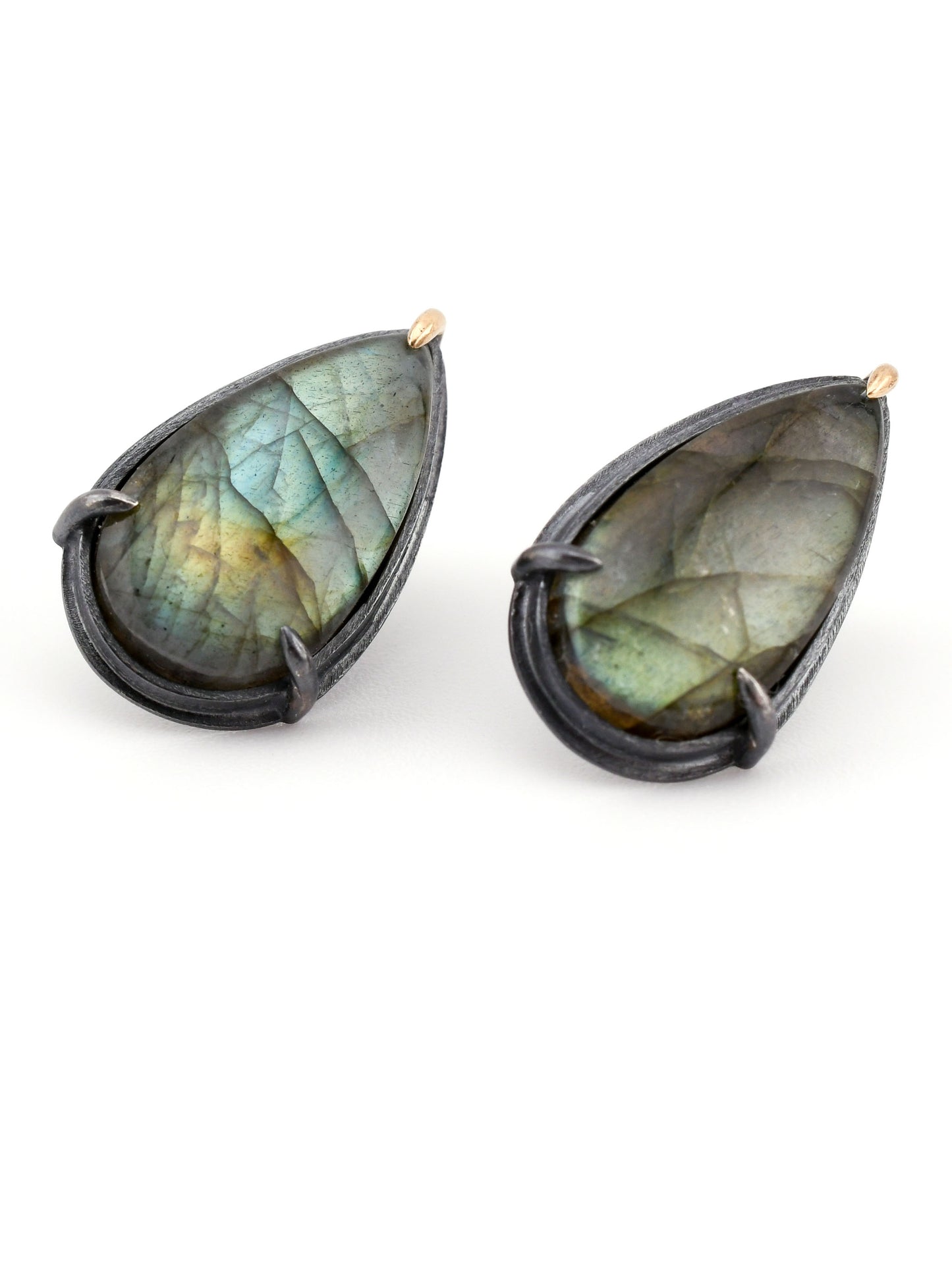 Teardrop-shaped labradorite earrings on a white background