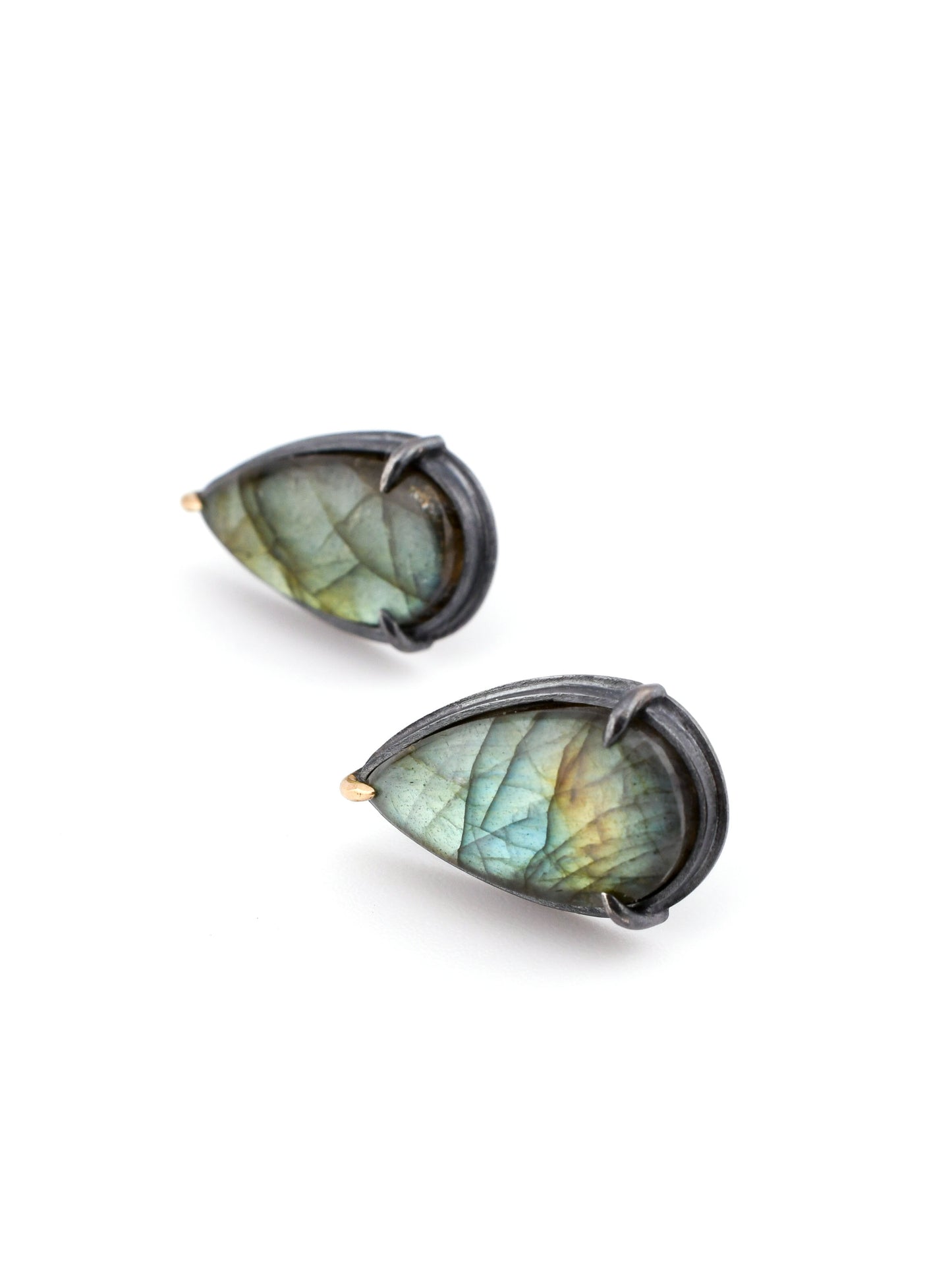 Teardrop-shaped labradorite earrings on a white background