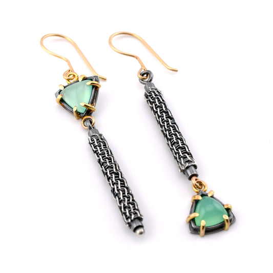Textured silver and green stone earrings with gold accents on a white background