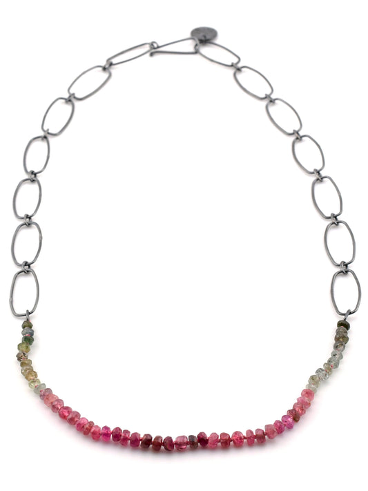 Necklace with small beads on a white background