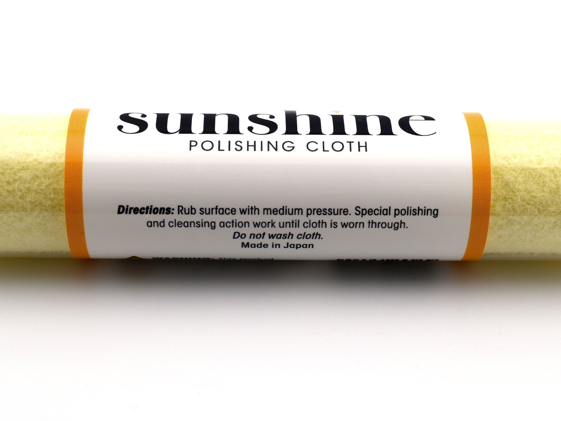 Roll of Sunshine polishing cloth with label on a white background